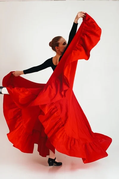 Flamenco dancer mid-step during a class